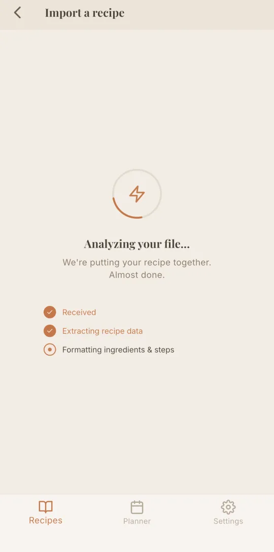 Cookfolio's import screen, the AI extracts a recipe from a link or a file.